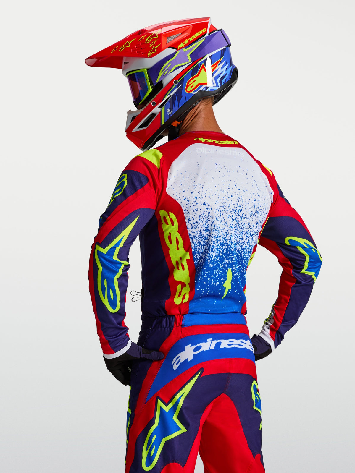 Alpinestars Maglia Fluid Drag, maglia da motocross da uomo, blu e rossa, tessuto tecnico leggero e traspirante.