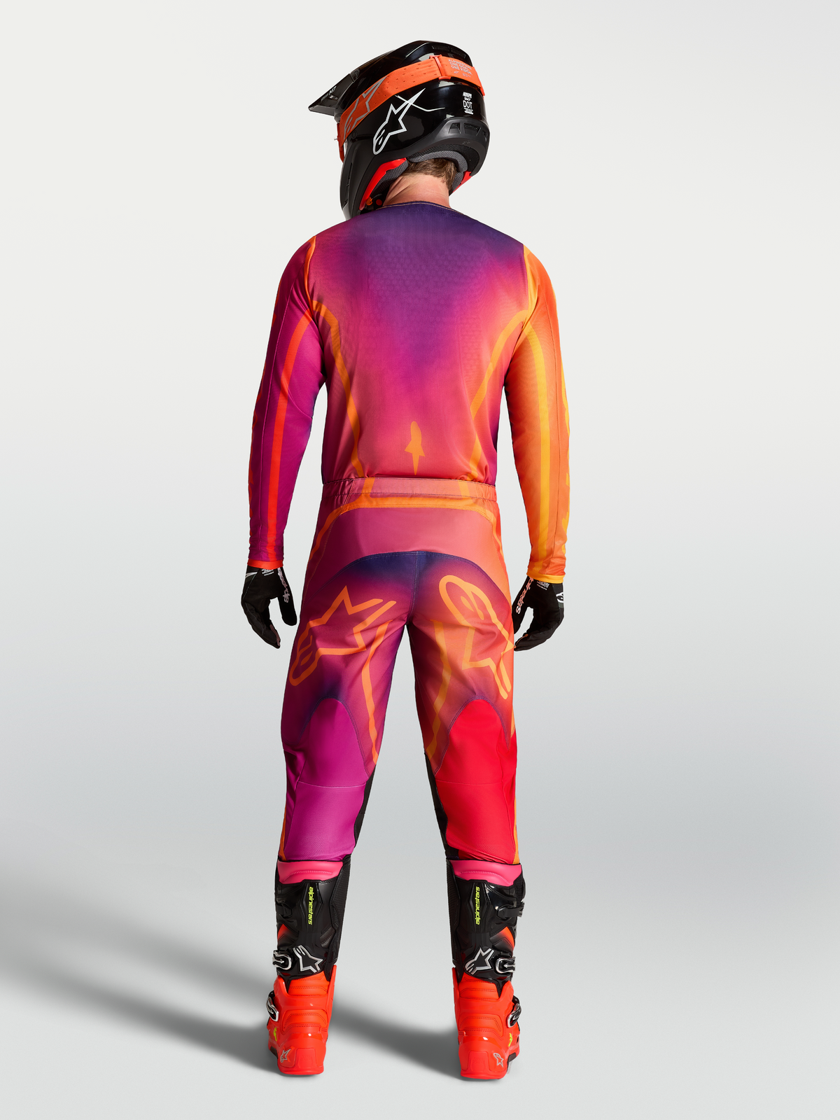 Alpinestars Pantaloni Fluid Kepler, pantaloni da motocross uomo, viola e arancione, vista posteriore, sport-fit per off-road