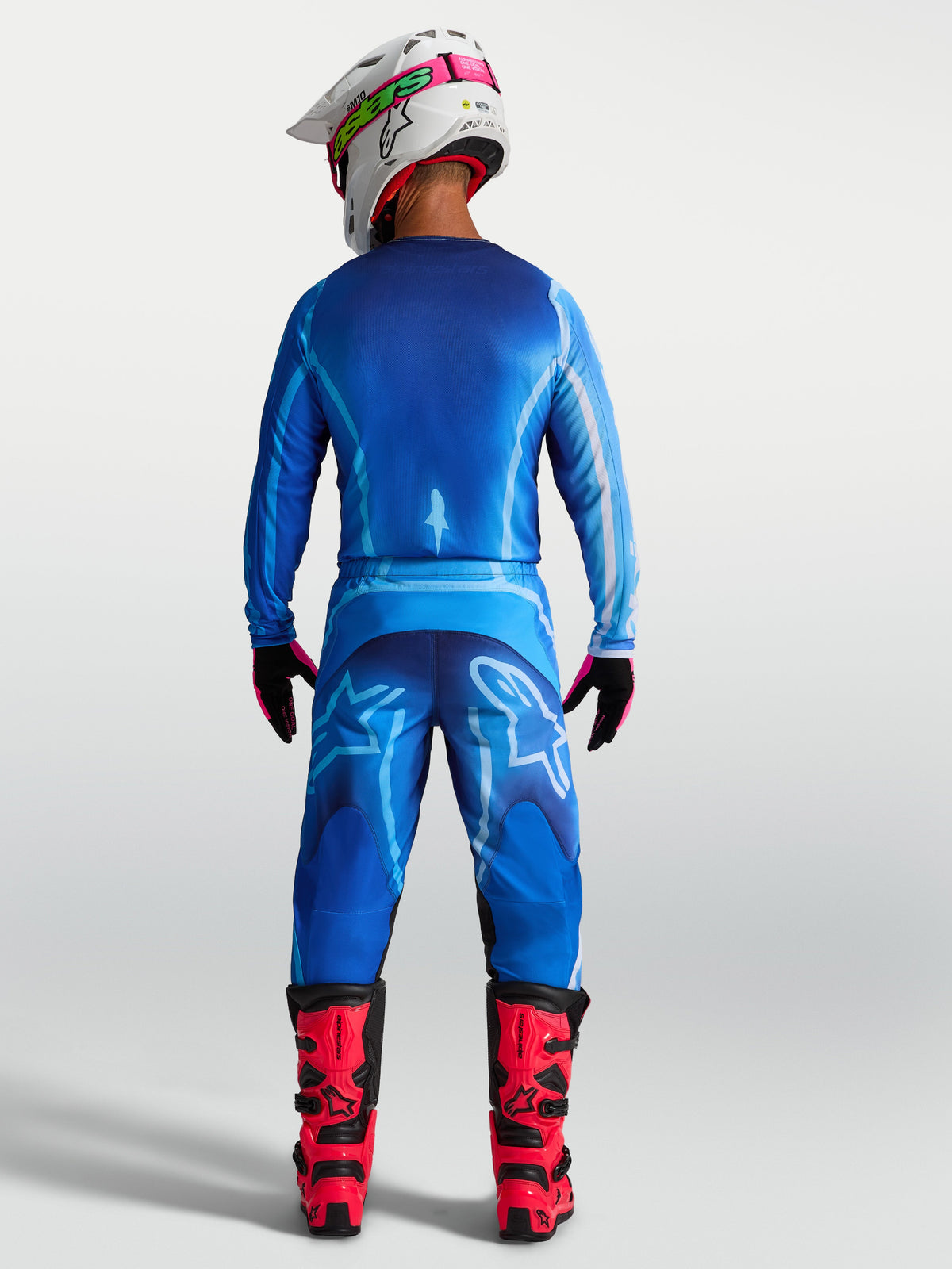 Alpinestars maglia Fluid Kepler, maglia da motocross da uomo, blu, vista posteriore con bordo allungato e traspirante.