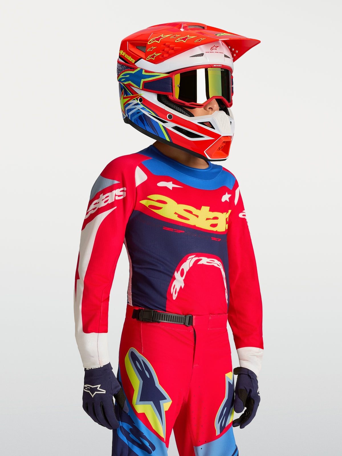 Alpinestars Maglia Supertech Dyna Ragazzo, maglia da motocross rossa e blu navy, in mesh leggero con vestibilità racing atletica.