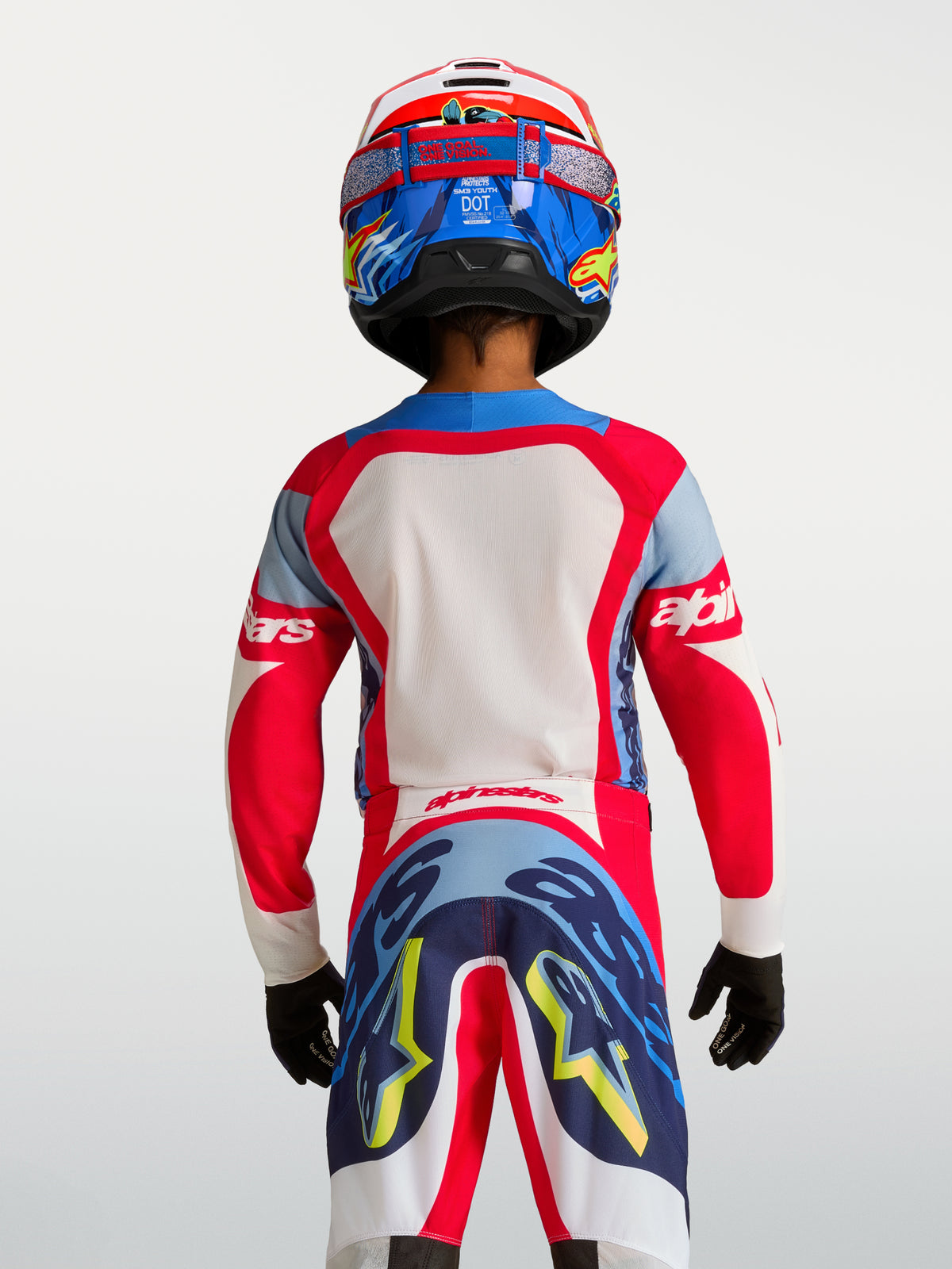 Maglia Alpinestars Supertech Dyna Ragazzo 2027, maglia da motocross rossa e blu navy, vista posteriore in mesh elasticizzato.