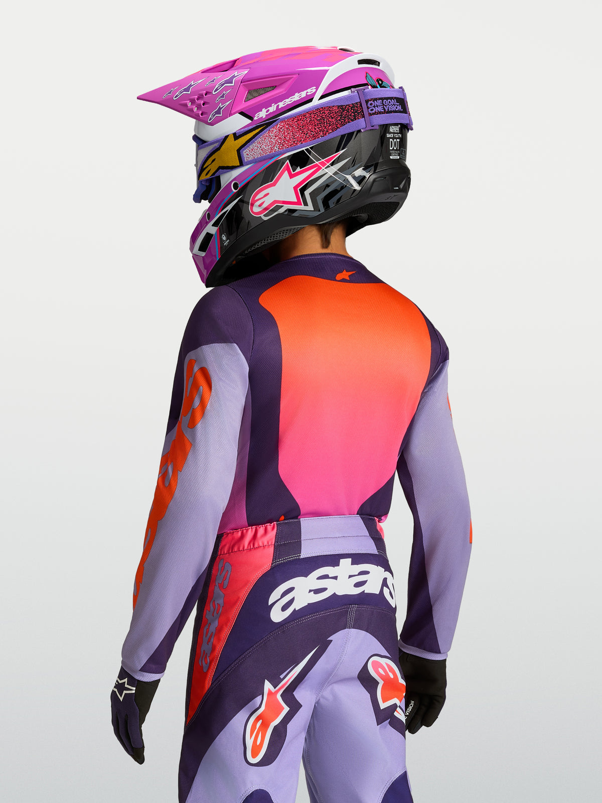 Alpinestars Maglia Fluid Hunt Ragazzo 2027, maglia da motocross viola e rosa in tessuto traspirante, vista posteriore.