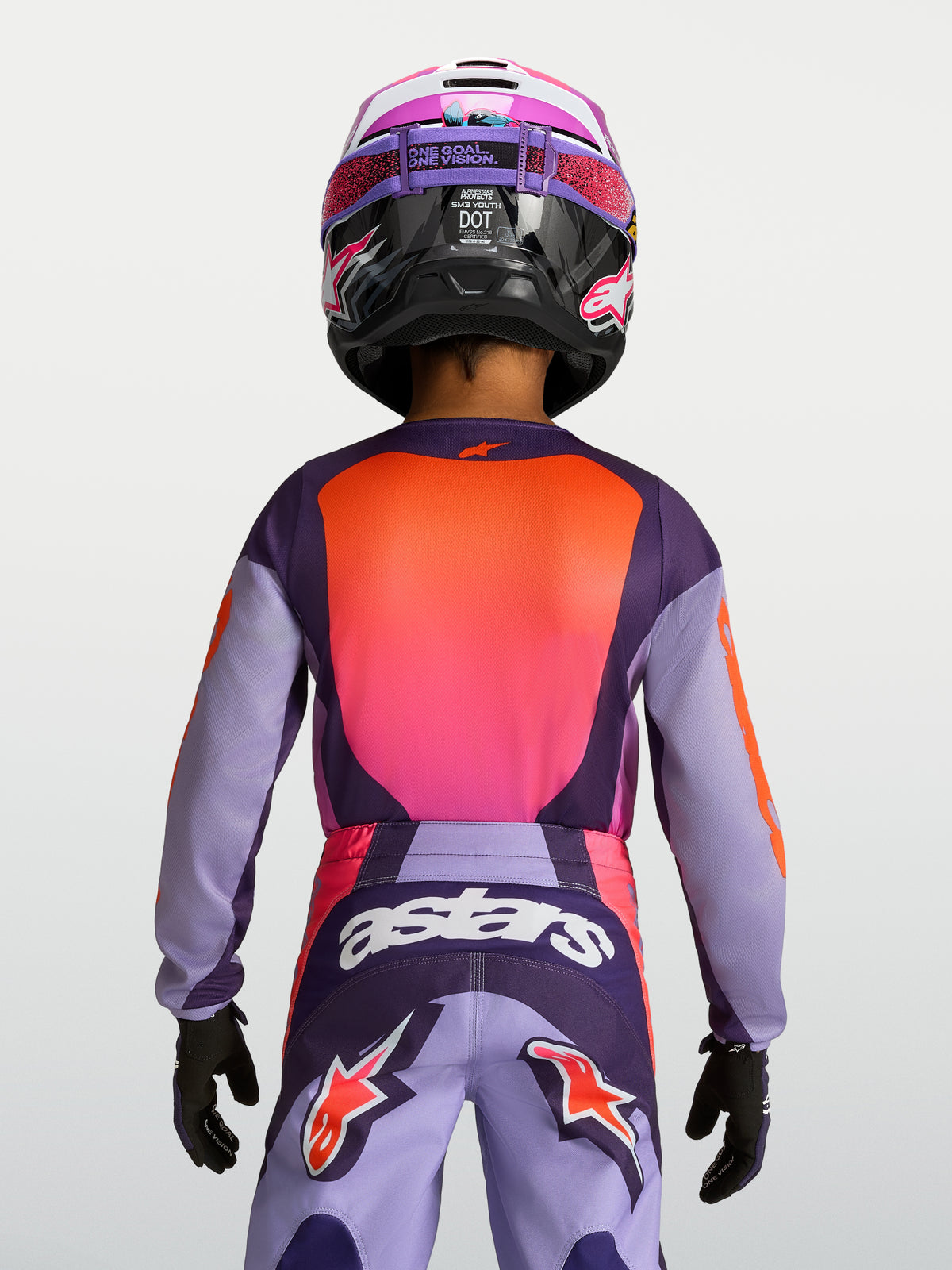 Alpinestars Maglia Fluid Hunt Ragazzo 2027, maglia da motocross viola e rosa, tessuto tecnico traspirante, vestibilità ergonomica per bambini, vista posteriore.