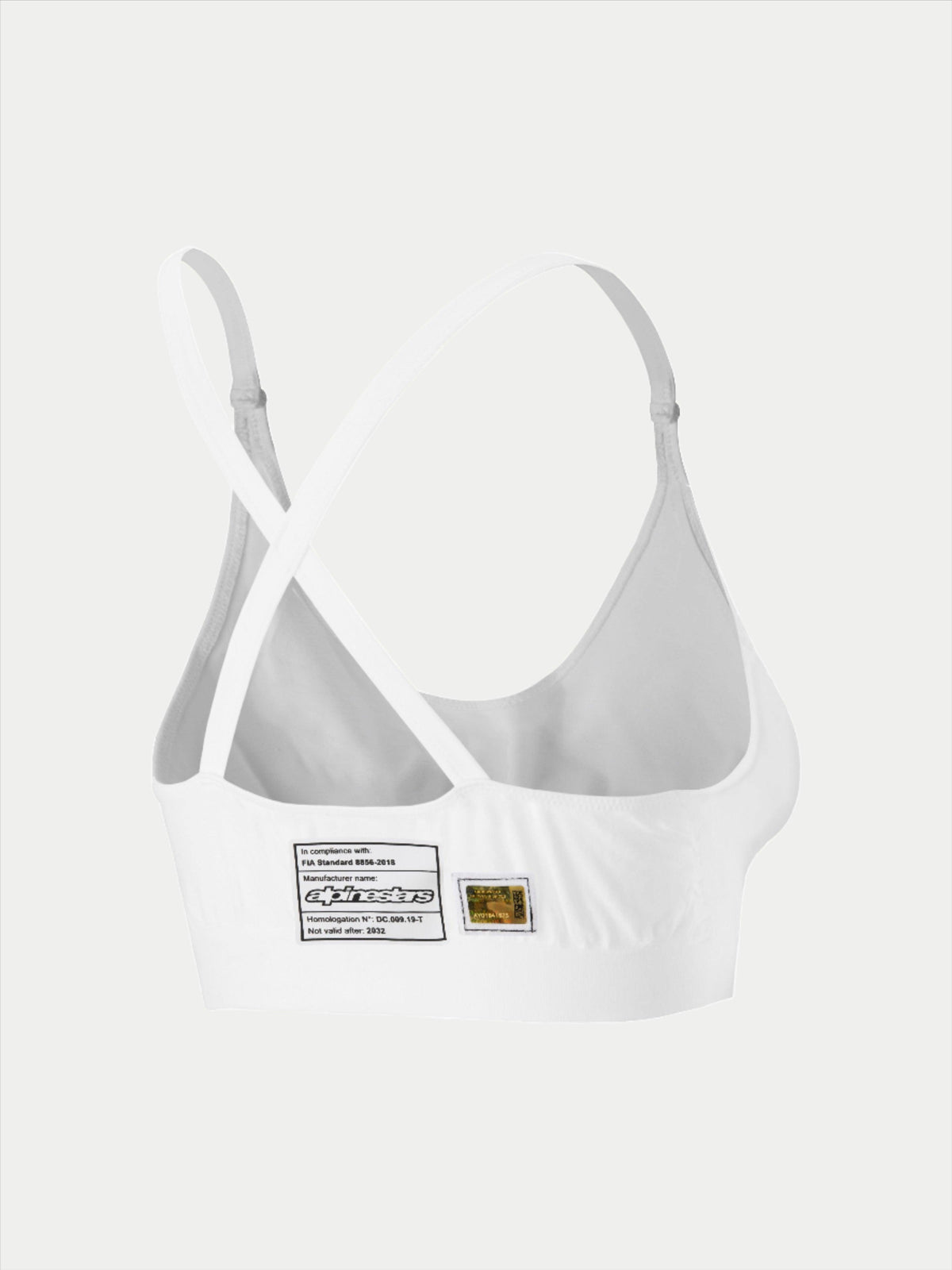 Alpinestars Stella TECH ZX Bra, intimo tecnico da corsa bianco ignifugo, vista posteriore con design delle spalline incrociate, etichetta di omologazione FIA 8856-2018 e ologramma, base layer leggero da donna