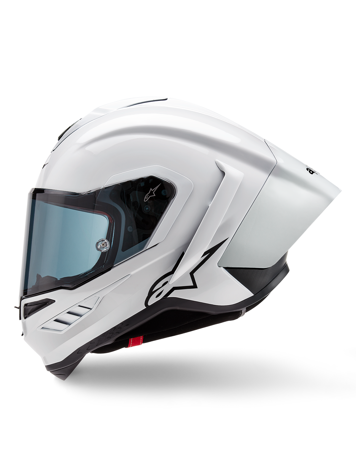 Casco Alpinestars Supertech R10 Solid, casco integrale da corsa, bianco lucido e nero opaco, vista laterale con spoiler aerodinamico integrato e visiera oscurata, con logo a stella Alpinestars nero