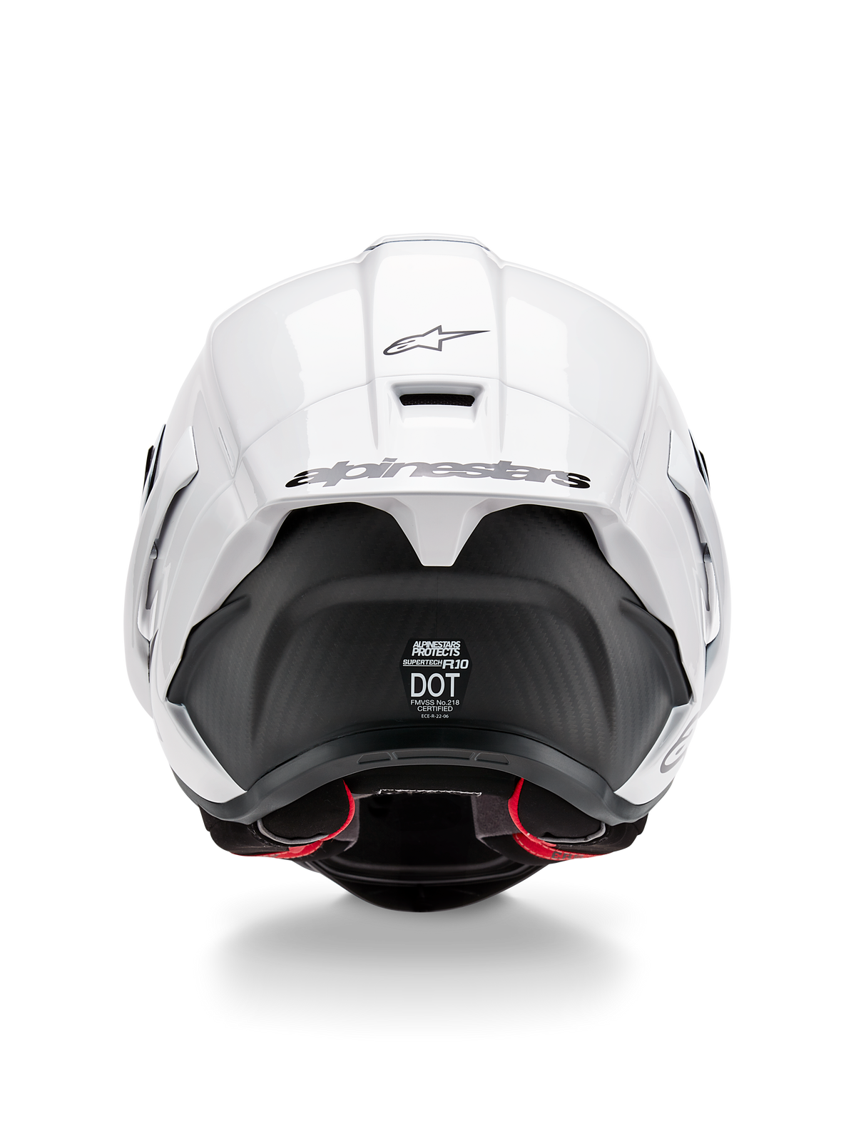 Casco Alpinestars Supertech R10 Solid, vista posteriore, parte superiore bianca lucida con sezione inferiore nera opaca, spoiler aerodinamico con logo Alpinestars nero, trama in fibra di carbonio a vista e decalcomanie delle certificazioni di sicurezza