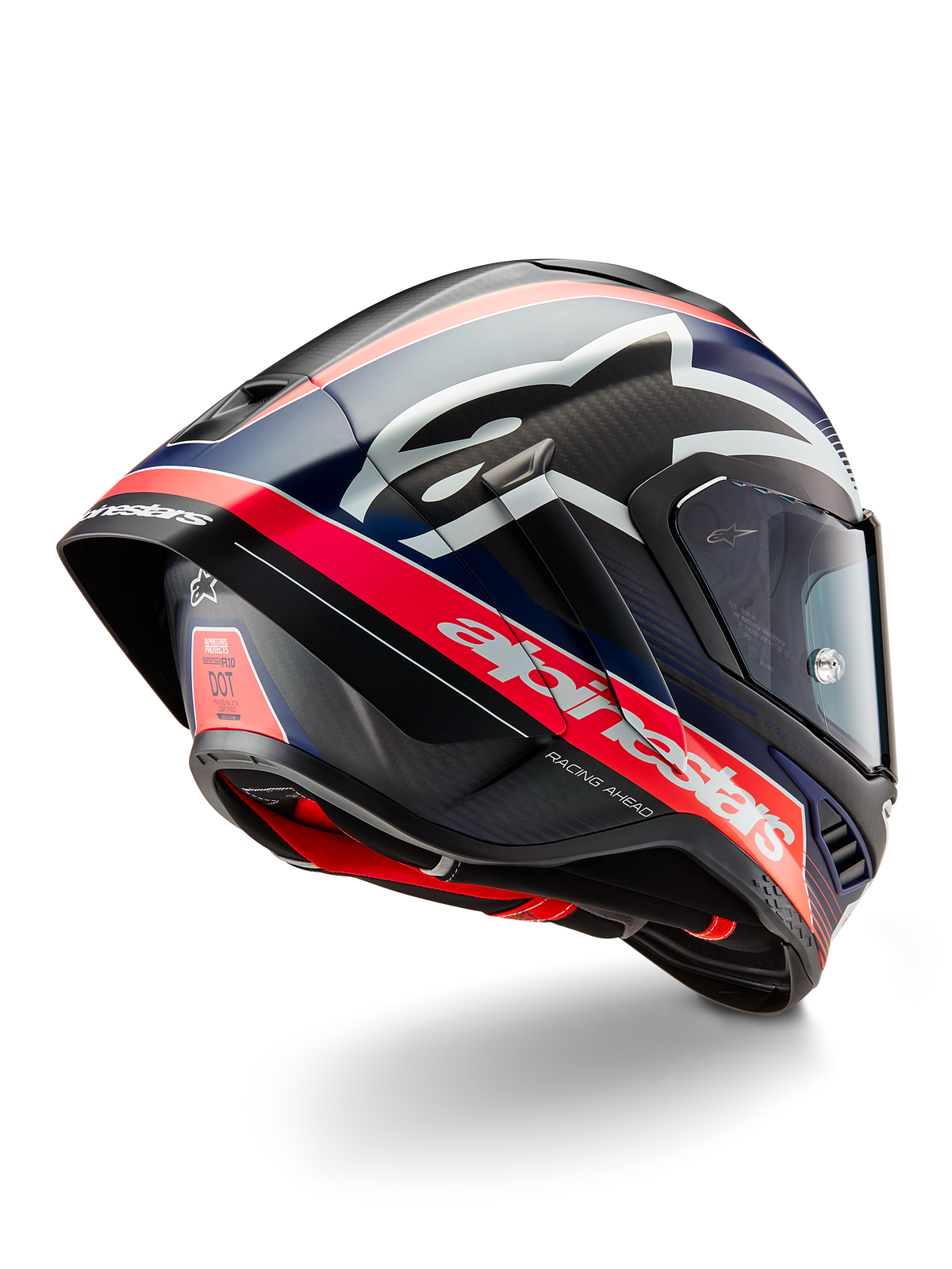 Casco Alpinestars Supertech R10 Team, casco professionale da competizione motociclistica, carbonio nero con dettagli rosso fluorescente e blu opaco, vista posteriore aerodinamica con spoiler integrato, branding Alpinestars in evidenza e trama della calotta in fibra di carbonio visibile.