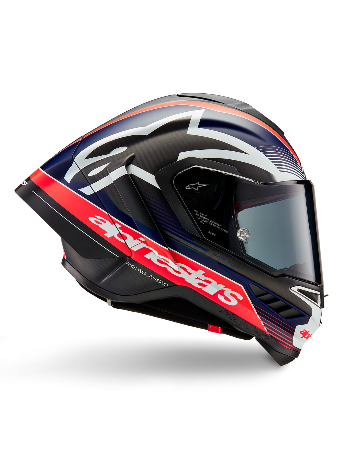 Casco Alpinestars Supertech R10 Team, casco da moto racing, carbonio nero con accenti rosso fluo e blu opaco, grande logo Alpinestars bianco, design aerodinamico con spoiler integrati, visiera trasparente, trama in fibra di carbonio a vista, profilo racing elegante
