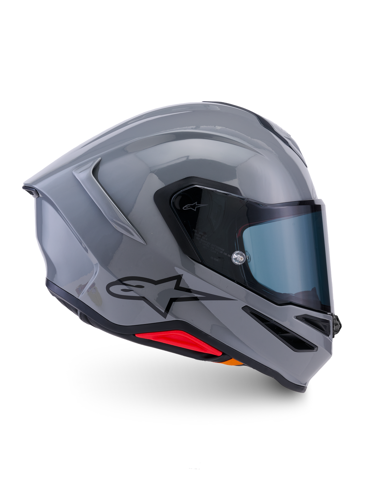 Casco Alpinestars S-R7 Solid, casco moto integrale, grigio lucido, vista laterale di profilo, calotta aerodinamica grigio lucido con logo nero e accenti rossi alla base, equipaggiamento per guida sportiva e corse ad alte prestazioni