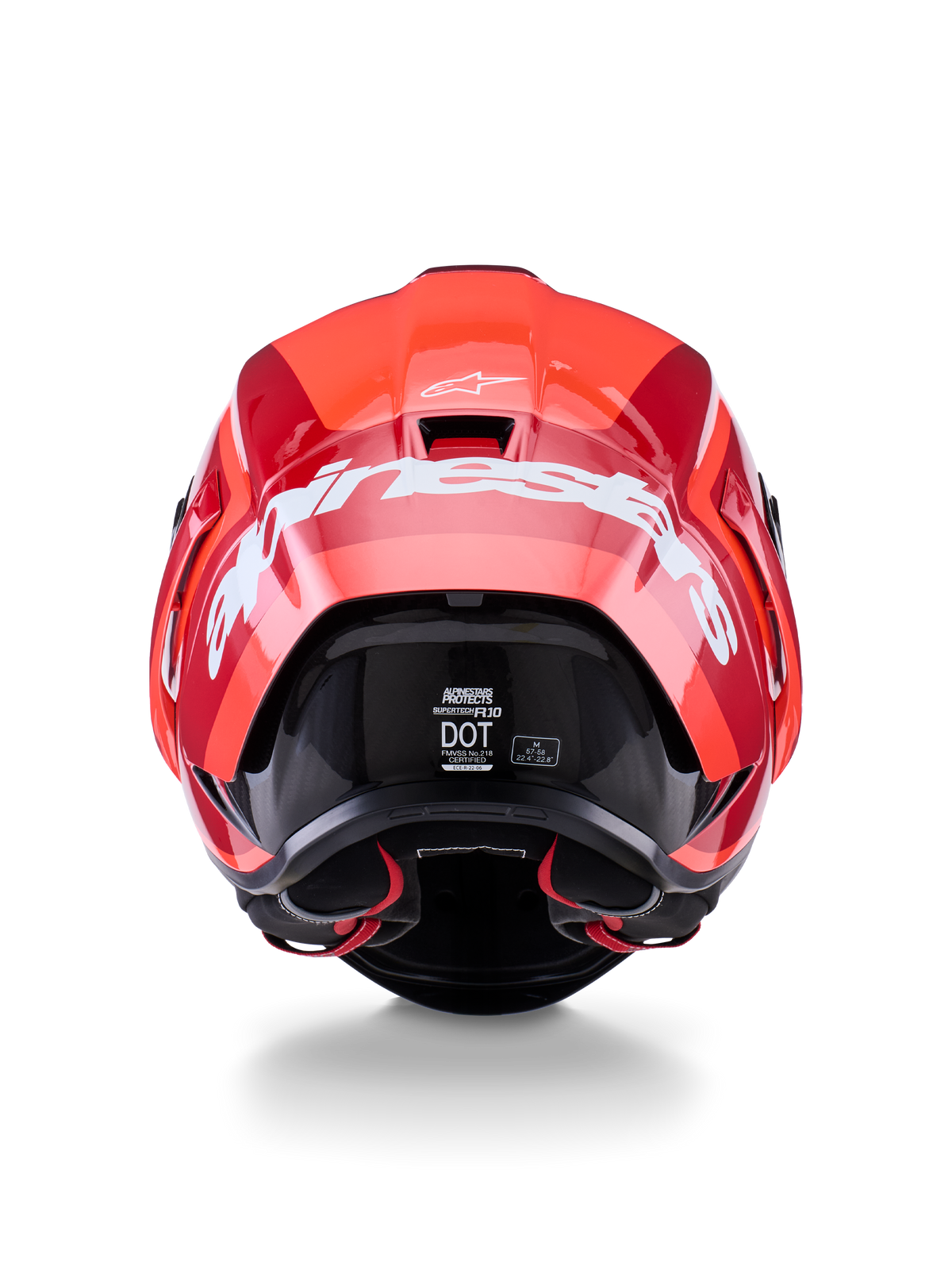 Casco Alpinestars Supertech R10 Arius, vista posteriore, design rosso lucido e rosso scuro, grande scritta Alpinestars bianca sul retro, etichette di certificazione DOT ed ECE visibili, casco da corsa aerodinamico ad alte prestazioni