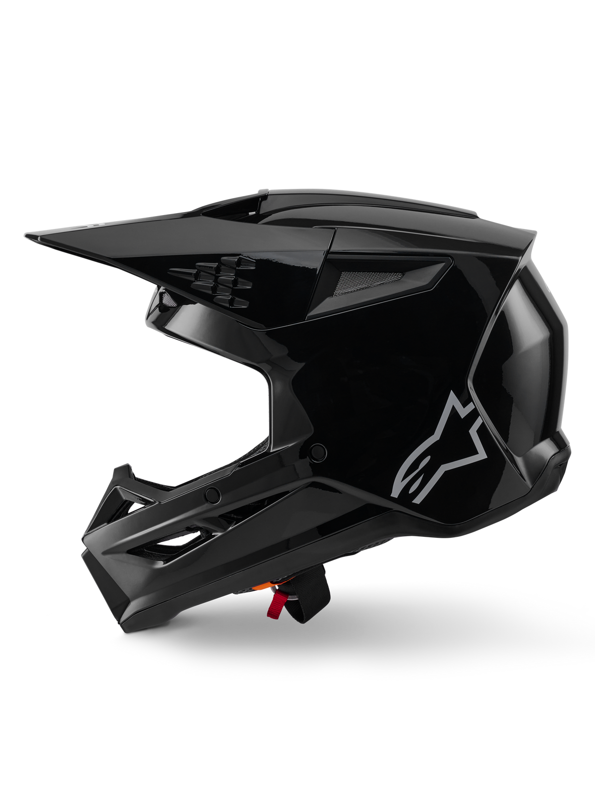 Casco Alpinestars S-M3 Solid, casco da motocross, nero lucido, vista laterale, logo Alpinestars argento, visiera aerodinamica e diverse prese d'aria per corse off-road