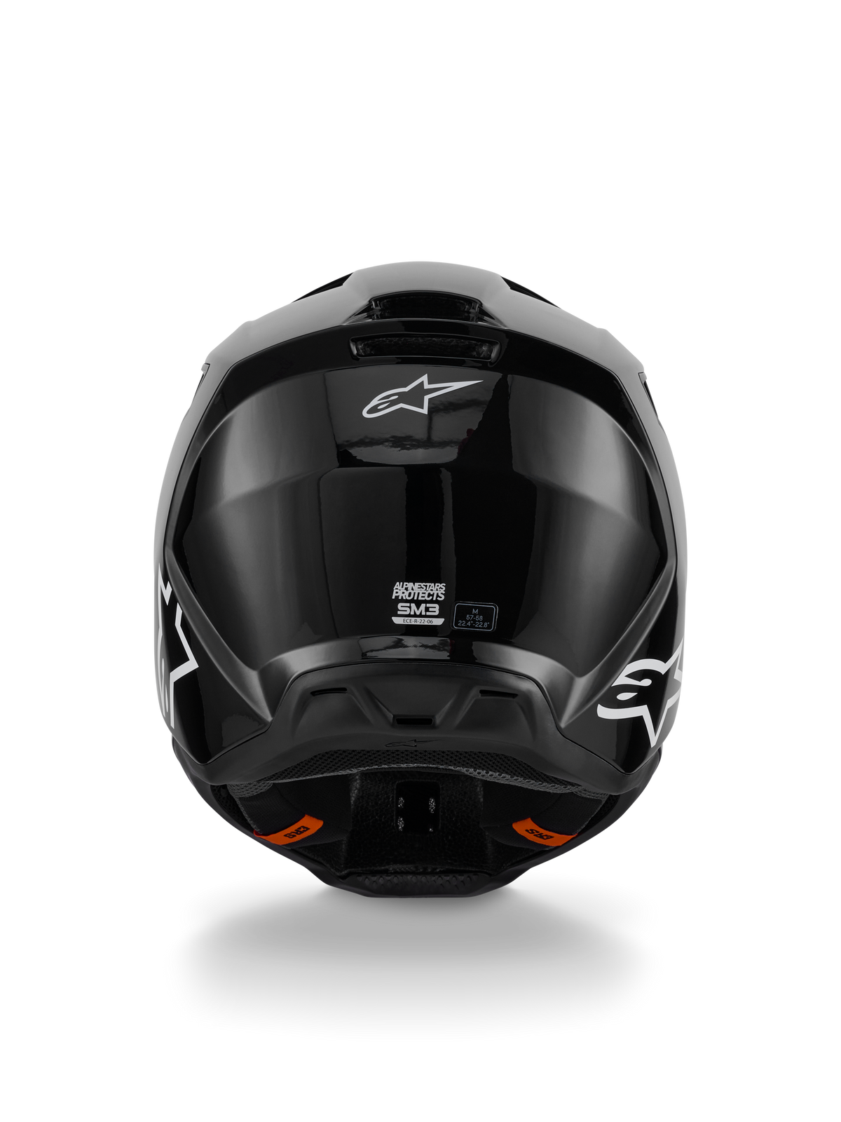 Casco Alpinestars S-M3 Solid, casco da motocross, finitura nero lucido, vista posteriore con logo Alpinestars bianco, etichetta di certificazione ECE 22.06 e calotta aerodinamica con estrattori d'aria