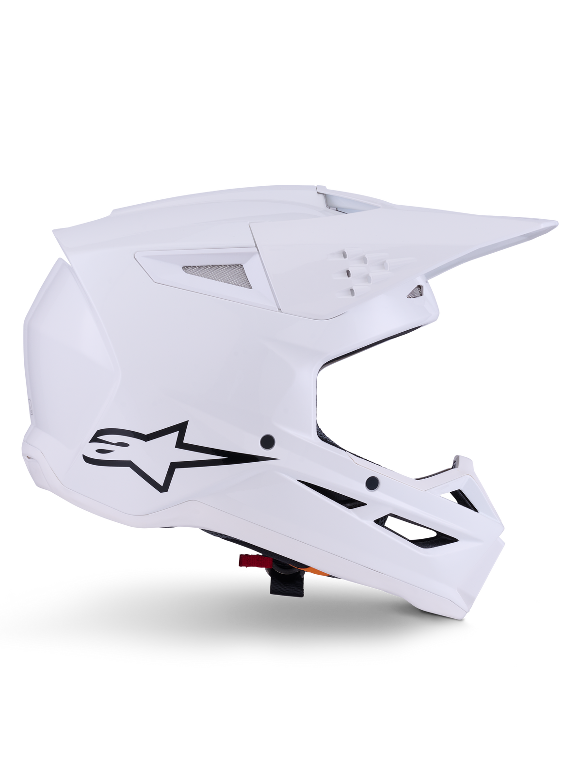 Casco Alpinestars S-M3 Solid, casco da motocross, bianco lucido, vista di profilo laterale con logo a stella nero, calotta aerodinamica angolare, prese d'aria multiple, visiera e mentoniera integrate, protezione per competizioni fuoristrada