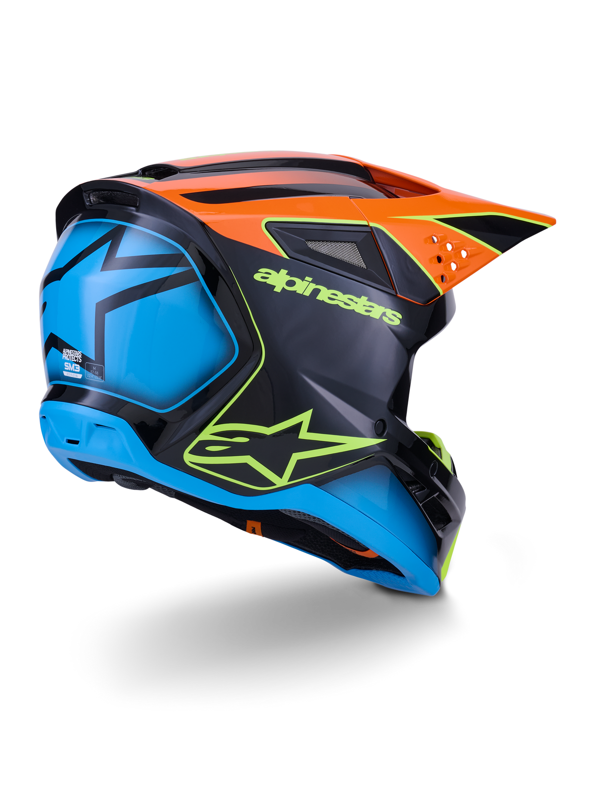Casco Alpinestars S-M3 Fray ECE 22.06, casco da motocross, nero con pannelli arancioni e blu, logo Alpinestars giallo neon, ampia sezione posteriore blu con grafica a stella, visiera arancione con prese d'aria integrate, attrezzatura protettiva professionale per fuoristrada