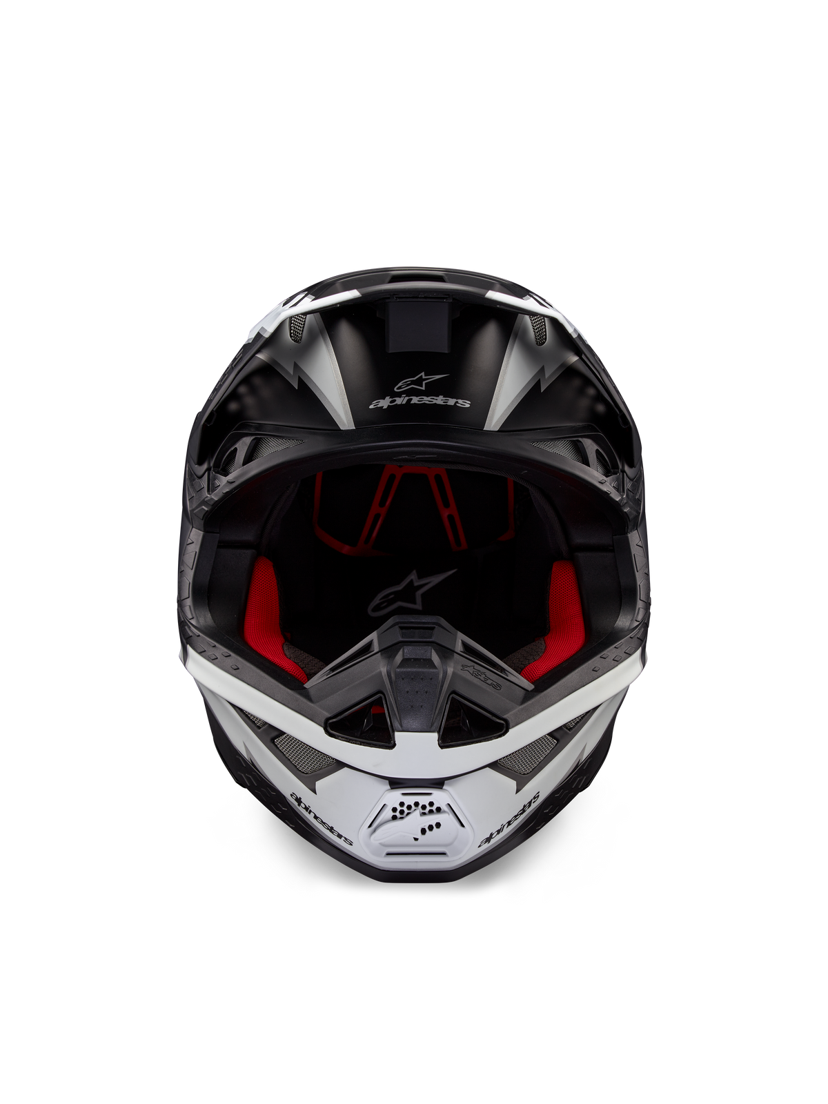 Casco Alpinestars Supertech M10 Ampress, casco da motocross, nero e bianco opaco, vista frontale con rivestimento interno rosso, calotta aerodinamica con porte di ventilazione e logo Alpinestars