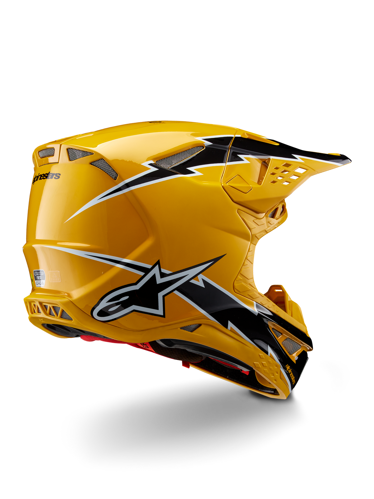 Casco Alpinestars Supertech M10 Ampress, casco da motocross, Nero Giallo Lucido, caratterizzato da una finitura gialla lucida con grafiche stile fulmine nere e bianche, vista posteriore di tre quarti che mostra la calotta aerodinamica e le prese d'aria integrate.