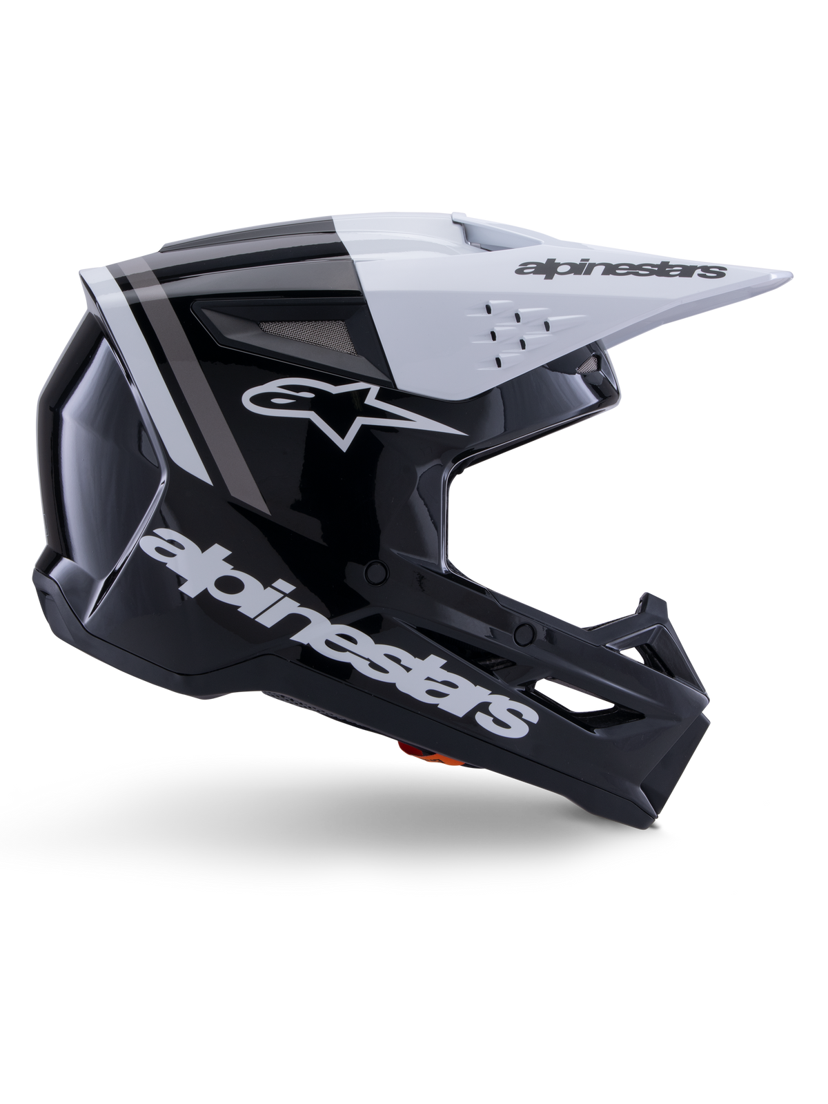 Casco Alpinestars S-M3 Radium, casco da motocross off-road, nero, bianco e grigio lucido, design aerodinamico angolare con prese d'aria, vista laterale, finitura lucida con strisce grigie e visiera bianca con logo Alpinestars