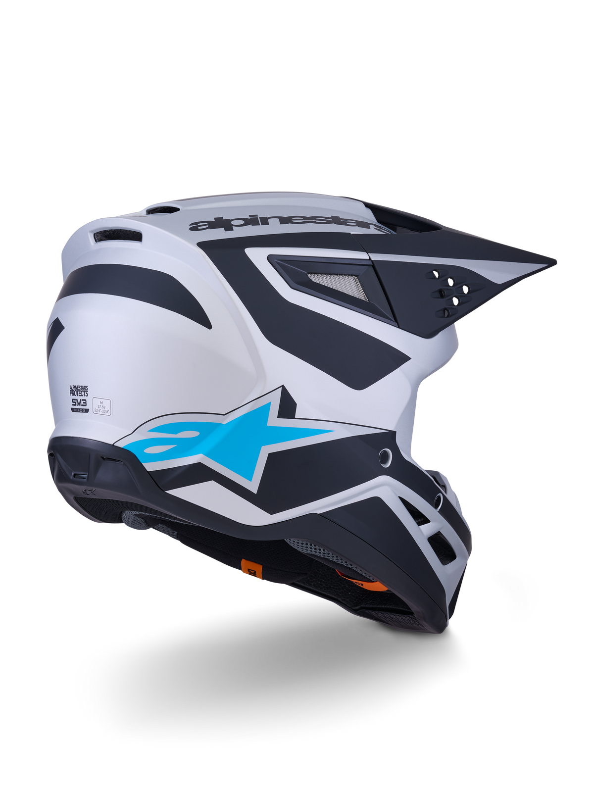 Alpinestars S-M3 Heat Helmet ECE 22.06, casco da motocross, argento, blu e nero opaco, vista posteriore con grande logo a stella blu e motivi angolari neri, calotta aerodinamica con porte di ventilazione, protezione per corse off-road ad alte prestazioni