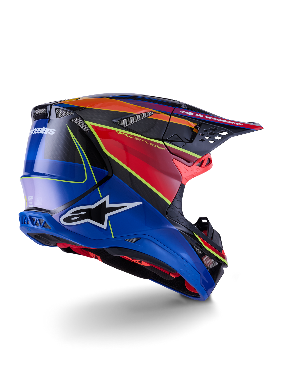 Casco Alpinestars Supertech M10 Era, casco da motocross, blu, rosso e giallo fluo lucido, vista laterale posteriore con dettagli in fibra di carbonio, logo Alpinestars in evidenza, prese d'aria integrate e finitura lucida per prestazioni fuoristrada.