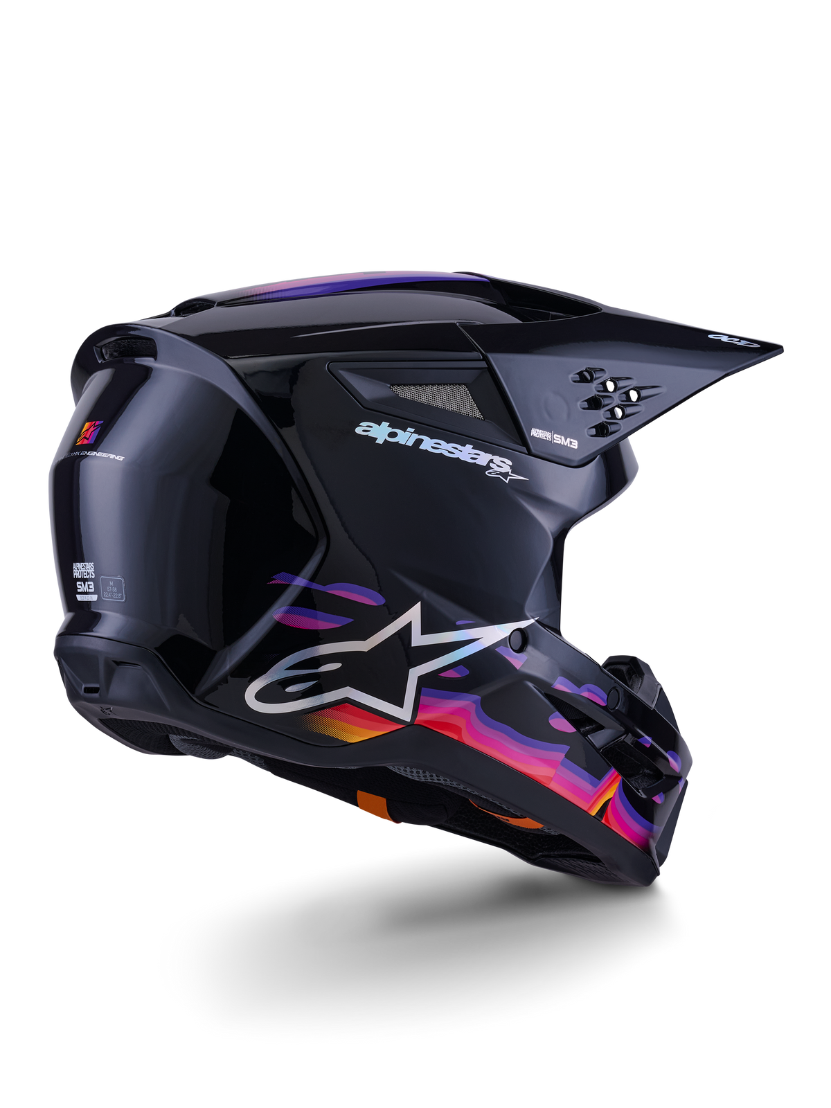 Casco Alpinestars S-M3 Force OCD, casco da motocross, nero lucido con vivaci grafiche a onde viola, rosa e arancione, con branding Alpinestars e logo A-star bianchi, vista a tre quarti posteriore, equipaggiamento da gara fuoristrada ad alte prestazioni