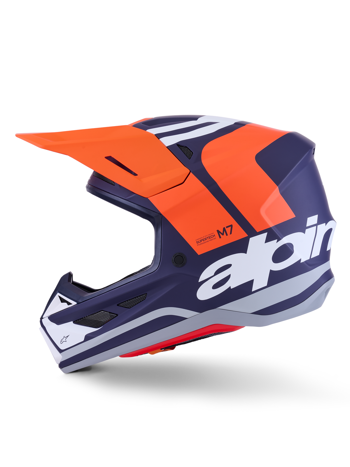 Casco Alpinestars S-M7 Core ECE 22.06, profilo laterale, finitura opaca blu navy e arancione, grande logo bianco laterale, casco da motocross aerodinamico con visiera protettiva