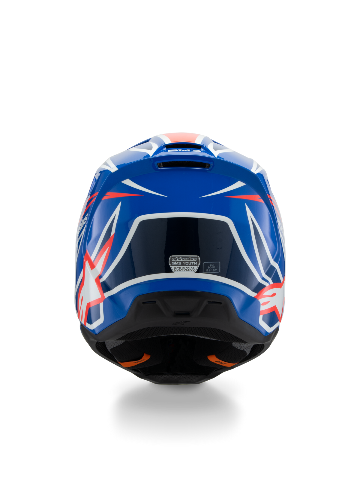 Alpinestars S-M3 Youth Wurx Helmet ECE 22.06, casco da motocross, blu, rosso e bianco, vista posteriore che mostra il design aerodinamico con bocchette di scarico, finitura lucida con accenti grafici nitidi e adesivo di certificazione di sicurezza.
