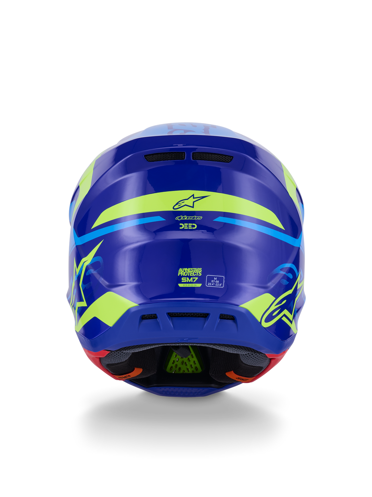 Alpinestars Casco S-M7 Deed ECE 22.06, casco da motocross, vista posteriore, blu giallo fluo lucido, con grafiche giallo fluorescente audaci e loghi a stella, prese di scarico posteriori e imbottitura interna visibile con tecnologia PLASMA verde.