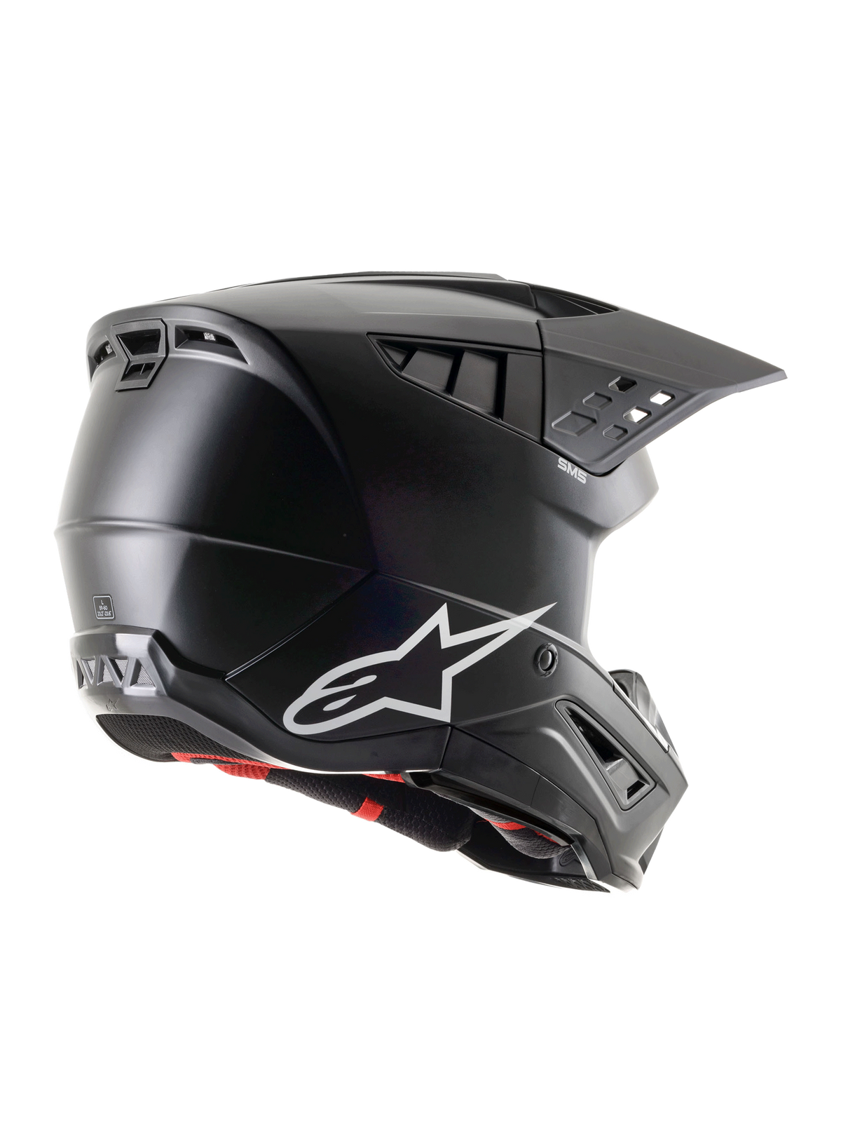 Alpinestars S-M5 Solid ECE 22.06, casco da motocross nero opaco, vista di profilo laterale-posteriore con logo Alpinestars bianco, molteplici porte di ventilazione e visiera integrata per la protezione nel fuoristrada