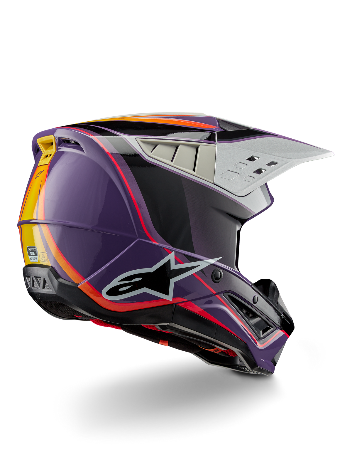 Alpinestars S-M5 Sail Helmet ECE, casco da motocross, viola, nero e argento lucido, con accenti a strisce arancioni e gialle, grande logo a stella nero, profilo aerodinamico con prese d'aria posteriori, finitura lucida per gare fuoristrada