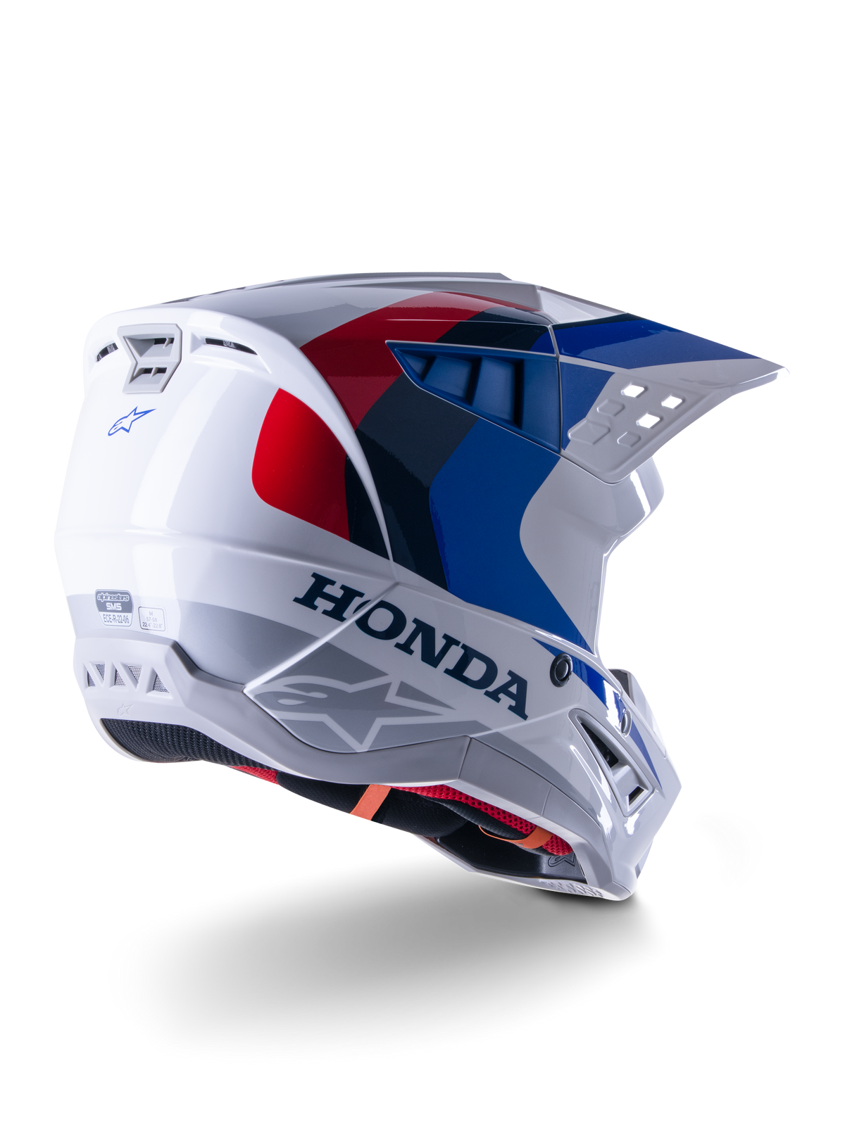 Alpinestars Honda S-M5 Helmet ECE, casco da motocross, bianco, blu e rosso lucido, con branding Honda e loghi Alpinestars, calotta aerodinamica con prese d'aria integrate e visiera regolabile, attrezzatura protettiva per corse fuoristrada