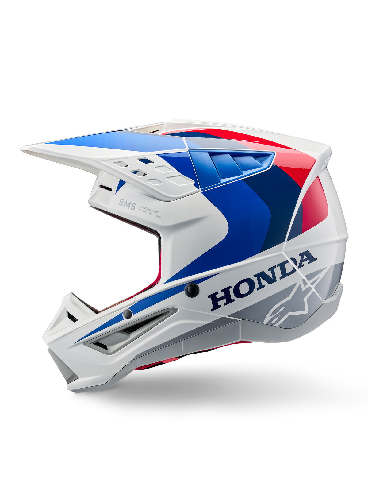 Casco Alpinestars Honda S-M5 ECE, bianco blu rosso lucido, vista laterale di profilo, con branding Honda e logo a stella Alpinestars, design aerodinamico da motocross con prese d'aria multiple e frontino prominente, finitura lucida