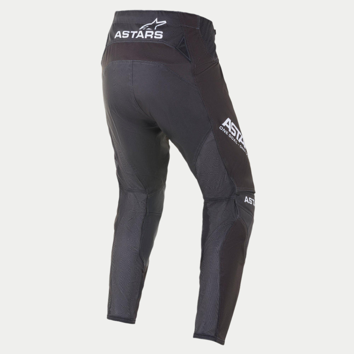 Alpinestars 2021 Techstar Phantom Pants, pantaloni da motocross, nero e bianco, vista posteriore con marchio ASTARS bianco sulla vita e sulla coscia laterale, pannelli in mesh testurizzato color carbone sulle gambe, design con vestibilità racing.