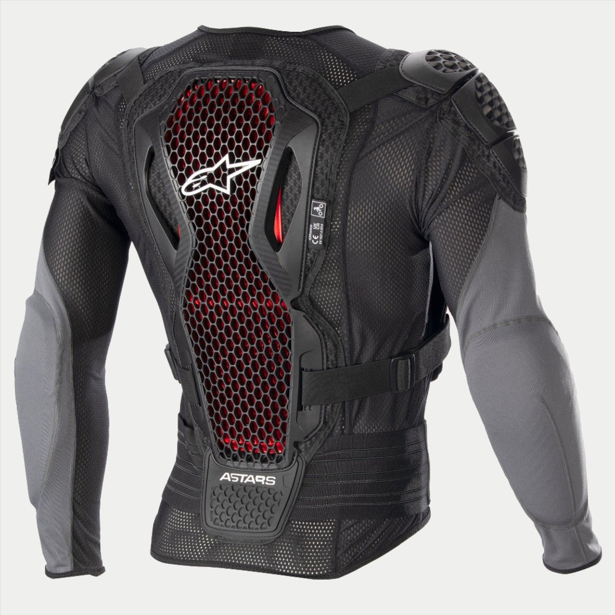 Giacca protettiva Alpinestars Bionic Plus V2, giacca protettiva da motocross, nero e grigio antracite con dettagli a nido d'ape rossi, vista posteriore che mostra il paraschiena con tecnologia Nucleon Cell di Livello 2, tessuto in rete traforata e protezioni integrate per spalle e gomiti.