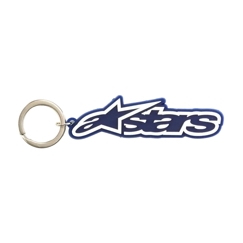 Alpinestars portachiavi Blaze, accessorio sportswear ispirato al racing, blu e bianco, costruzione in gomma 3D con logo frontale e anello a scatto in metallo