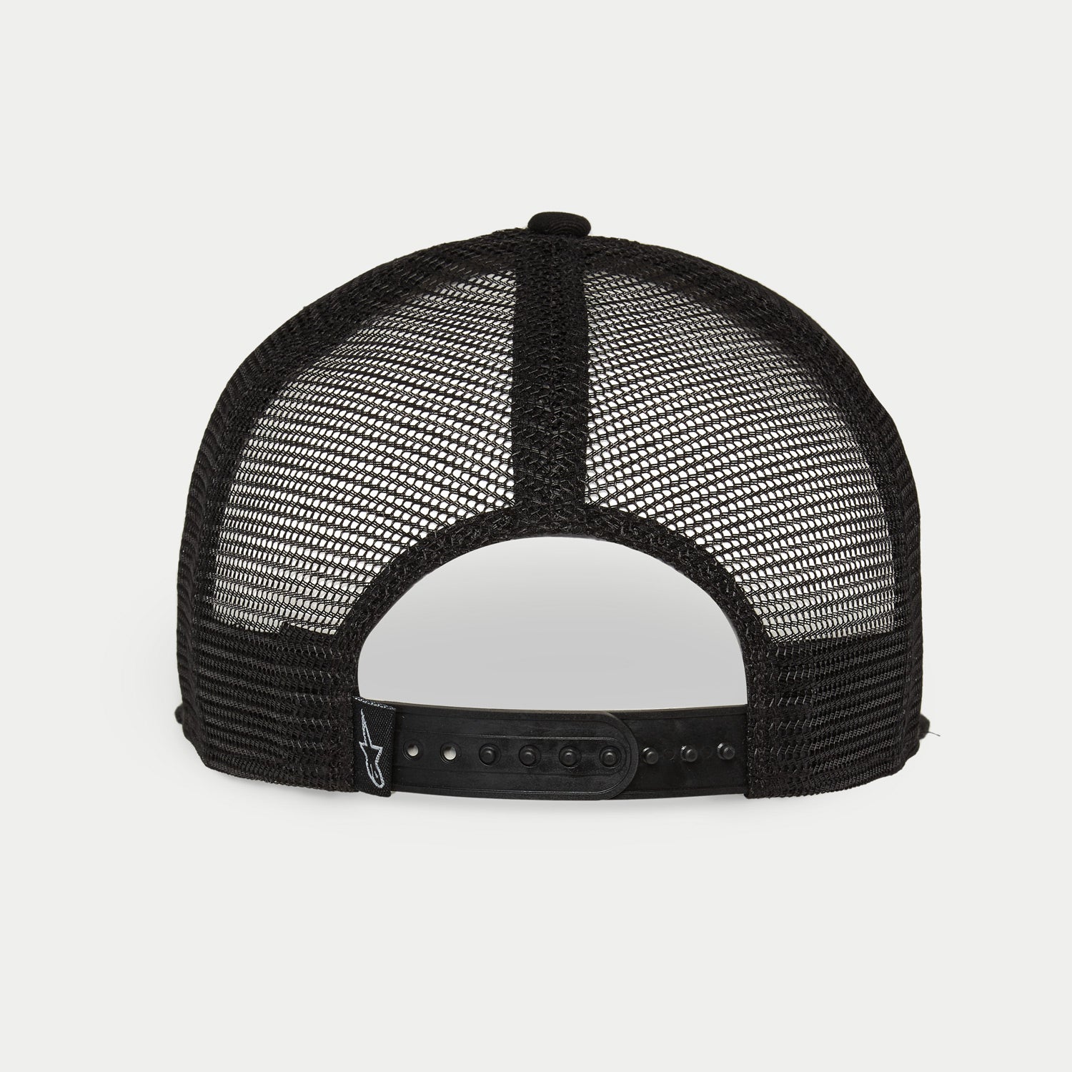 Cappello Alpinestars Corp Trucker, bianco e nero, vista posteriore con pannelli in mesh traspirante nero, chiusura snapback regolabile, piccolo logo Alpinestars sull'etichetta posteriore, copricapo casual ispirato al motorsport