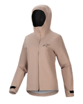 Alpinestars Stella A-Dura Rain Jacket, giacca antipioggia da ciclismo da donna, marrone chiaro, design con cappuccio, cerniera frontale e patta protettiva, polsini regolabili in velcro neri, piccolo logo sul petto, materiale performante impermeabile e traspirante per MTB
