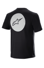 Alpinestars Dot Tech Tee, maglia da ciclismo a maniche corte, nero, vista posteriore con grande cerchio bianco e logo A-star nero, tessuto traspirante DriRelease per mountain bike