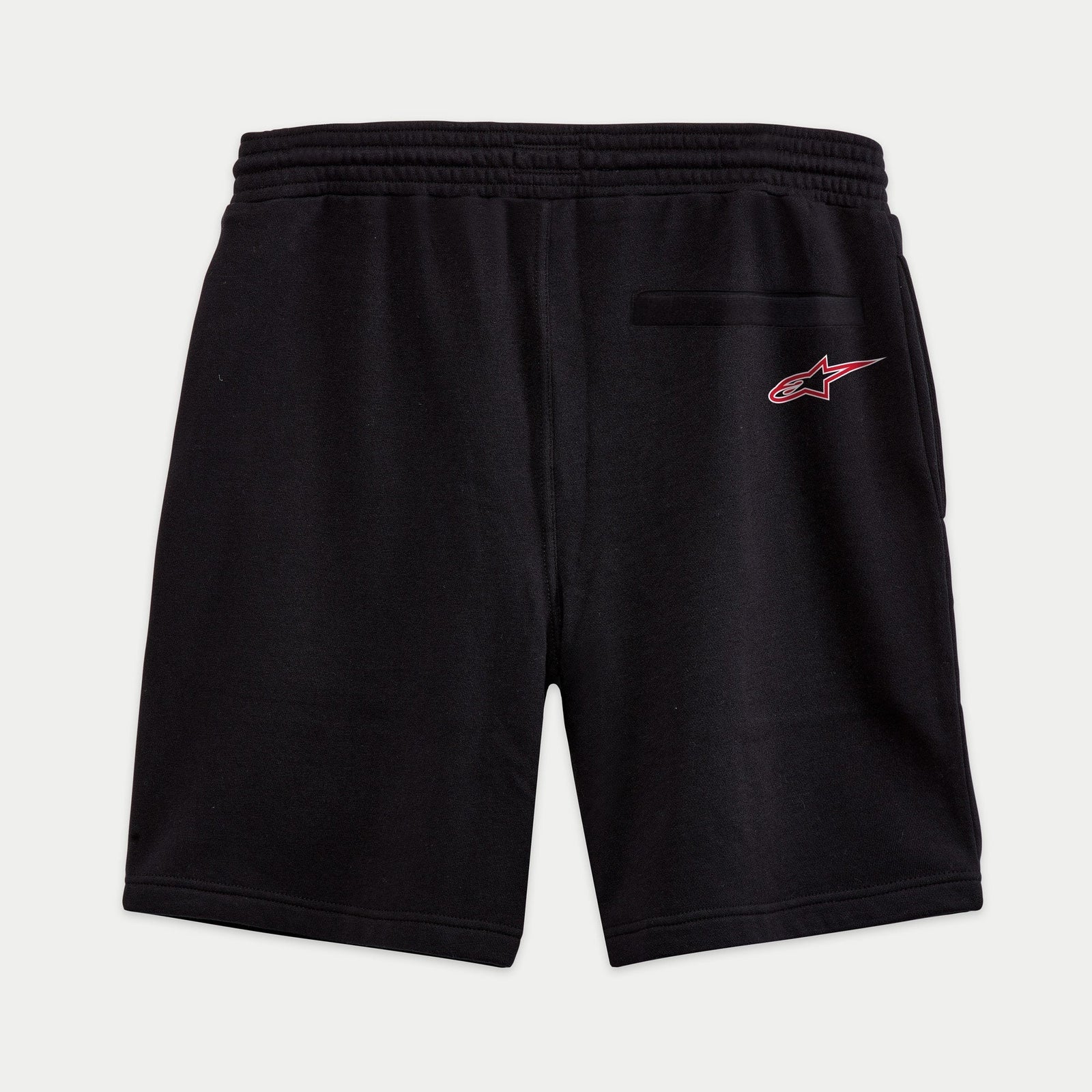 Alpinestars Dunker Short, pantaloncini da allenamento in pile, nero, vista posteriore con logo Ageless rosso e bianco sulla tasca a filo, cintura elastica, design casual e sportivo