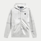 Alpinestars Plenitude Hoodie, felpa con zip frontale, bianco sporco con stampa logo grigia all-over, patch logo Ageless nera sul petto, tasche a marsupio, cappuccio con cordino, streetwear casual ispirato al motorsport