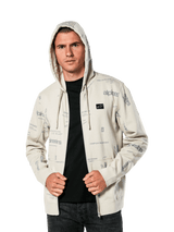 Felpa con cappuccio Alpinestars Plenitude, abbigliamento sportivo casual, felpa Off White con zip frontale e grafiche grigie all-over, indossata da un uomo con il cappuccio alzato sopra una maglia nera, con piccola patch del logo sul petto e tasca a marsupio