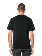 Alpinestars MX Helmet CSF Tee, t-shirt a maniche corte, nero, vista posteriore su modello, abbigliamento casual motorsport streetwear