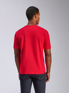 Alpinestars CSF Tee, t-shirt a maniche corte, rosso, vista posteriore, indossata con jeans scuri, casual motorsport streetwear