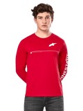 Alpinestars Committed CSF Long Sleeve Tee, rossa, indossata da un modello, con logo Astars bianco sul petto e grafica Alpinestars sulla manica, linea orizzontale bianca sul petto, streetwear casual ispirato al motorsport
