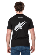 Alpinestars Formulate CSF Tee, maglietta a maniche corte, nero, vista posteriore con grande logo Astars bianco traforato e piccolo marchio Alpinestars, abbigliamento sportivo casual ispirato al motorsport