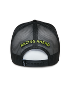 Cappello Trucker Alpinestars Exceed, cappellino trucker nero, vista posteriore con pannelli in rete e chiusura snapback, ricamo 'RACING AHEAD' in verde lime, copricapo casual ispirato al motorsport
