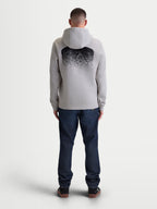 Alpinestars Felpa con cappuccio Obsessed, felpa sportswear da uomo in pile grigio cemento e nero, vista posteriore con grande grafica sfumata ispirata all'MX, abbigliamento casual motorsport lifestyle con cappuccio e bordi a coste