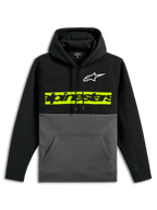 Felpa con cappuccio Parallel Alpinestars, felpa casual a blocchi di colore, parte superiore e maniche nere con fondo grigio gunmetal, logo Astars bianco sul petto, barra orizzontale giallo-verde con logo Alpinestars nero, cappuccio con cordino e tasca a marsupio frontale