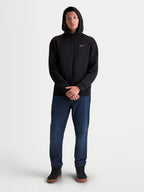 Alpinestars Felpa Con Cappuccio Cypher, giacca con cappuccio sportswear da uomo, nero, in pile double face con zip integrale, cappuccio a collo alto foderato in rete e logo Astars bianco sul petto, indossata da un modello per uno stile casual quotidiano.