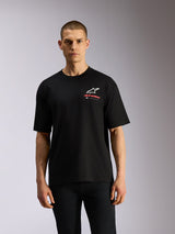 Alpinestars Overhang Oversized CSF Tee, t-shirt a maniche corte, nero, con logo Astars bianco e scritta Alpinestars rossa sul petto, casual motorsport streetwear