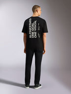 Alpinestars One Oversized CSF Tee, maglietta a maniche corte, nero, stampa verticale sul retro 'ALPINESTARS ONE GOAL. ONE VISION.' con logo Astars, abbigliamento casual lifestyle streetwear